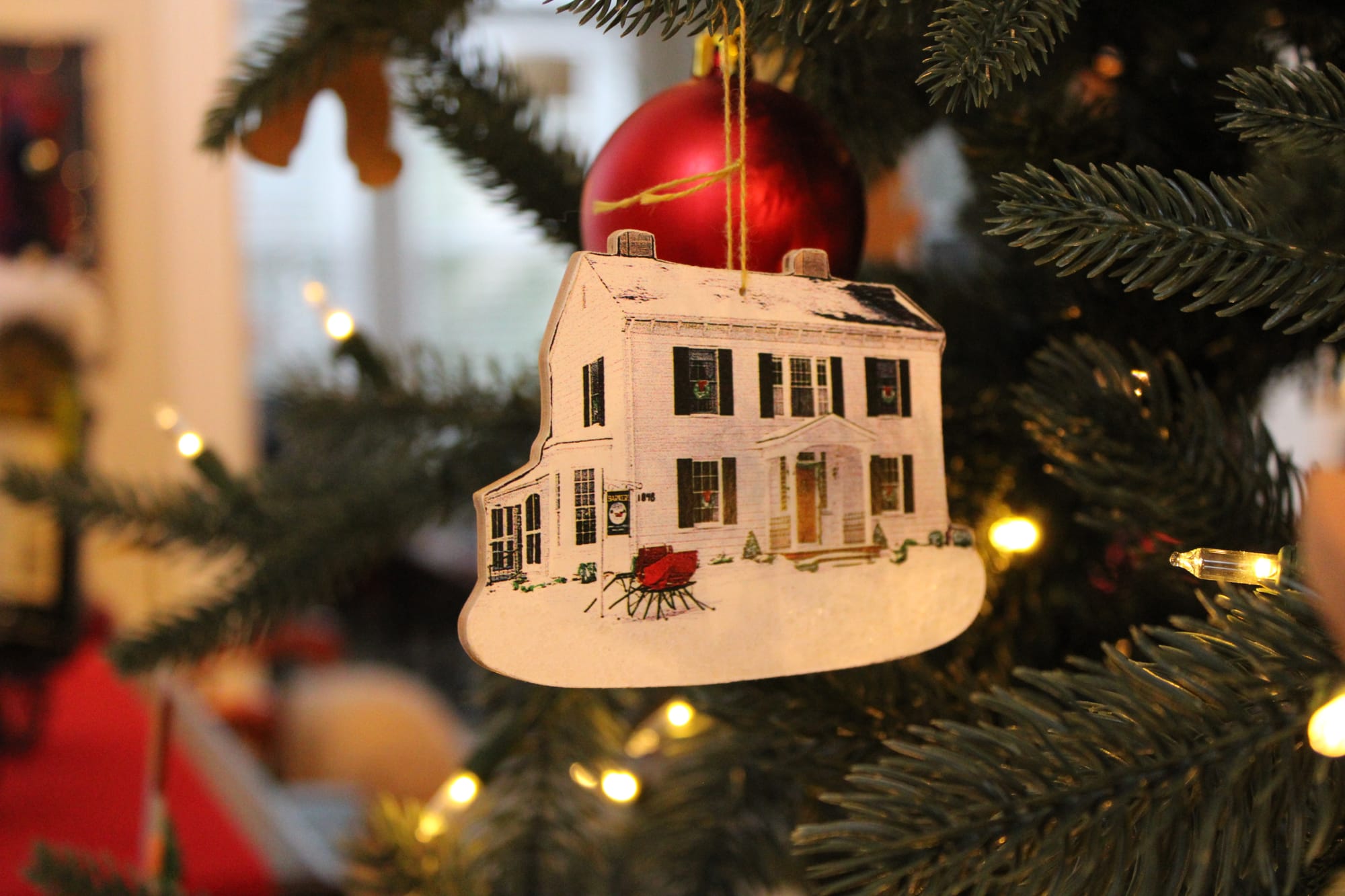 An ornament depicting the Barker homestead