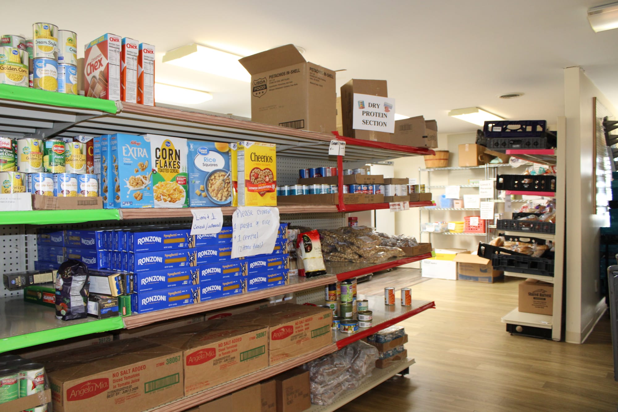 Shelves of food in the TOPSS food pantry