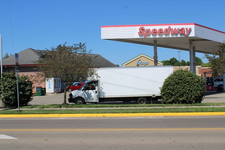 White Speedway gas station with truck in front