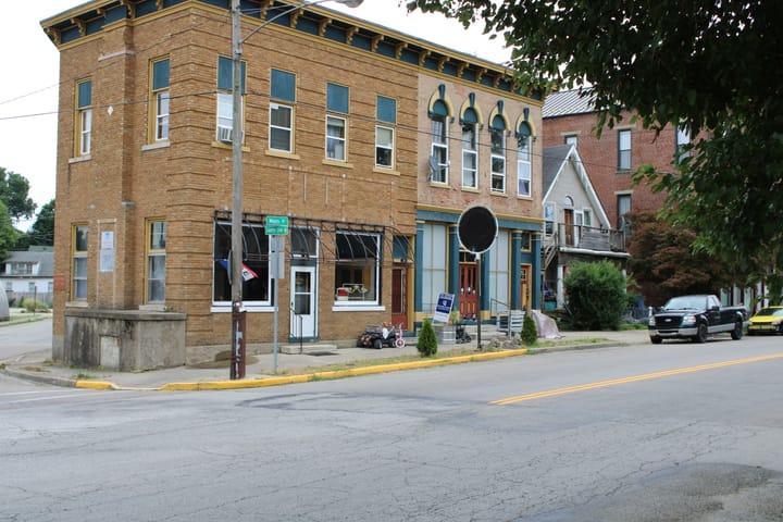 Brick buildings on a street corner in College Corner