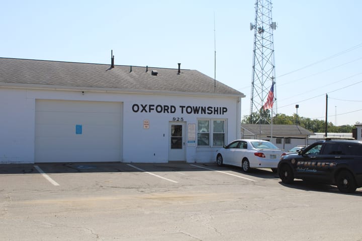 An Oxford Township police cruiser parks in front of the Oxford Township building