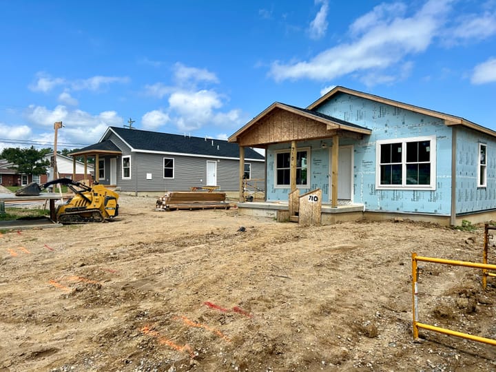 Two houses side to side being built