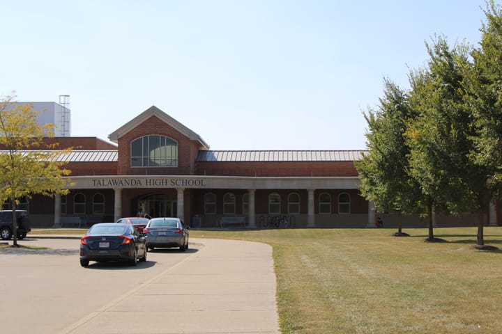 The entrance to Talawanda High School on a sunny day