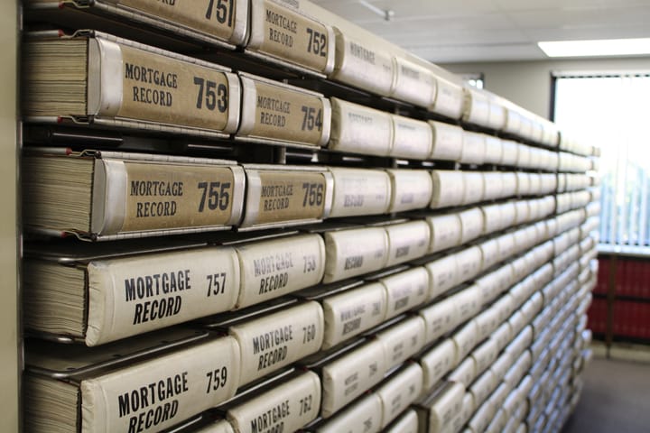 Shelves filled with mortgage records