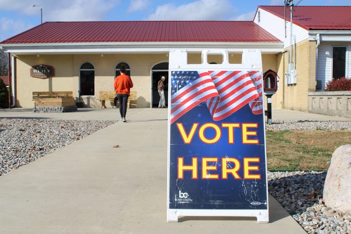 A "vote here" sign outside the Reily Township Community Center