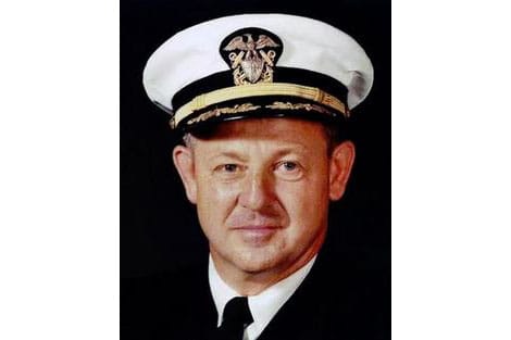 Kenneth M. Glass wearing a Navy hat