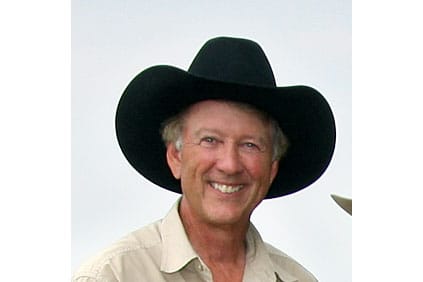 William Roe wearing a black cowboy hat