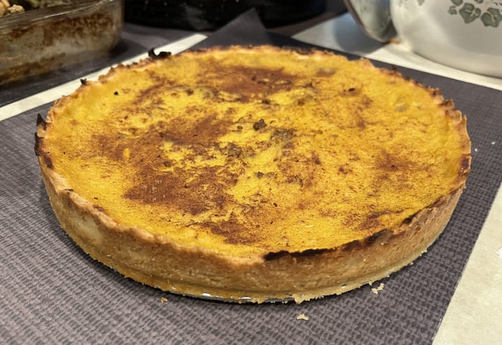 A yellow squash tart covered in cinnamon