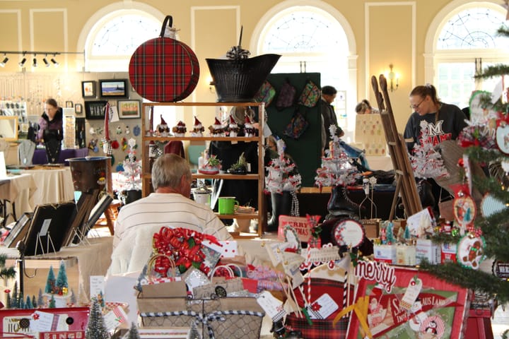 A bunch of Christmas decor and products scattered across varying displays