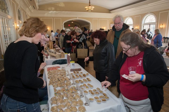 Visitors to the Chocolate Meltdown look at chocolatiers' displays