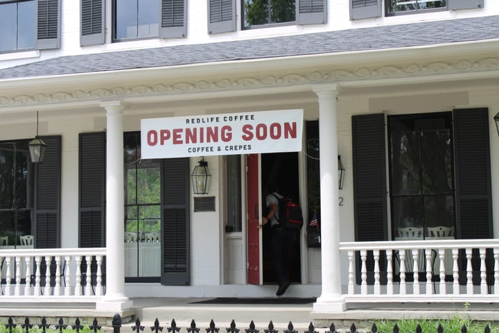 Red Life Coffee pictured in summer 2024 with an opening soon sign