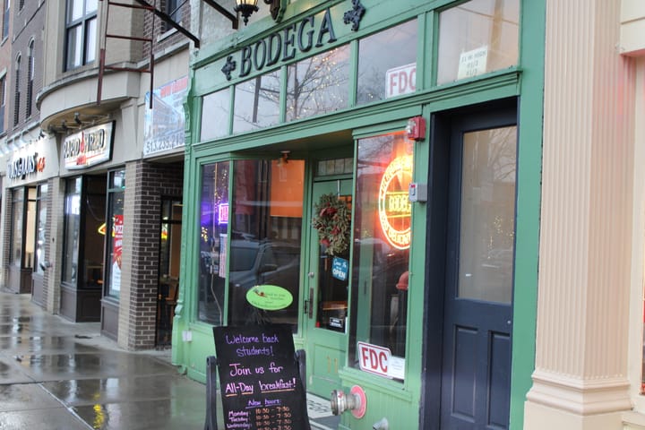 Green storefront of Bodega